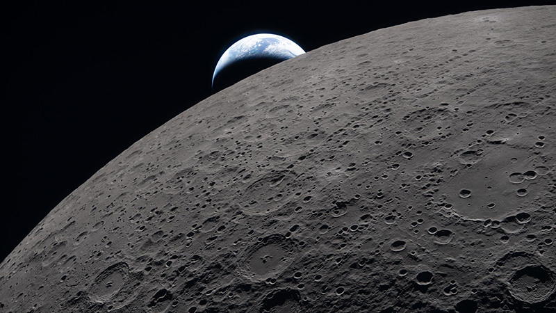  The lunar surface, as seen during the Artemis II lunar fly-by, with the Earth in the background.Picture credit: NASA